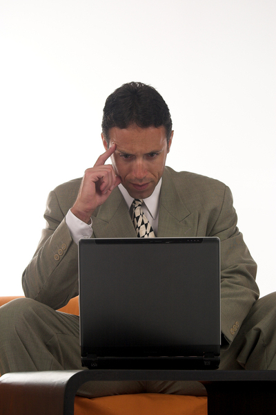 business_man_thinking_at_computer.jpg